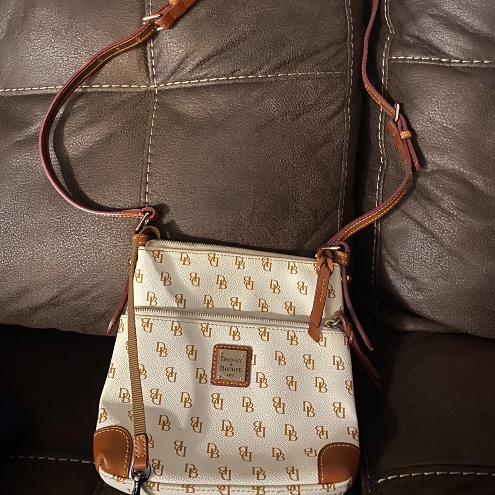 Dooney & Bourke white and tan logo crossbody purse